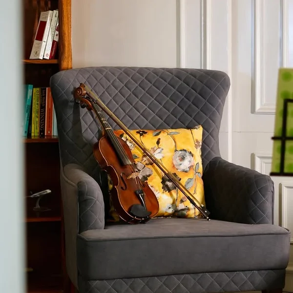 Armchair and violin in the BrandClef studio library